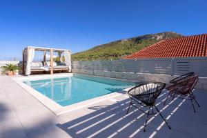 Πισίνα στο ή κοντά στο Villa Belpur