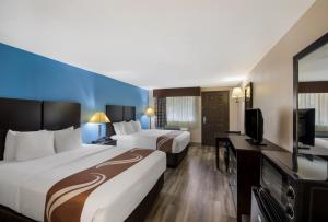 Postel nebo postele na pokoji v ubytování Quality Inn & Suites Round Rock