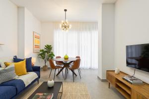 TV a/nebo společenská místnost v ubytování Soho Apartments in Malaga by Solaga Holiday Homes