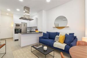 A kitchen or kitchenette at Soho Apartments in Malaga by Solaga Holiday Homes
