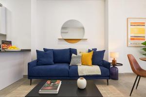 A seating area at Soho Apartments in Malaga by Solaga Holiday Homes