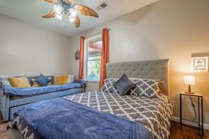 a bedroom with a bed and a window at Forest Cabin by China Creek in Oakhurst