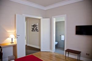 Televízia a/alebo spoločenská miestnosť v ubytovaní Adamas Luxury Suite 501