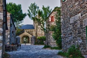 an alley in an old stone building at Casa Pazos, Pedrafita do Cebreiro in Piedrafita