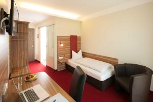 TV a/nebo společenská místnost v ubytování Come IN Hotel