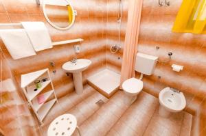 Kúpeľňa v ubytovaní Apartments Spavalo + 37 fotografií