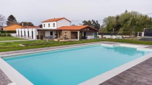 Bazén v ubytování Casa O Real nebo v jeho okolí