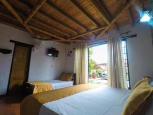 Postel nebo postele na pokoji v ubytování Finca Hotel La Quinta Porra + 37 fotografií