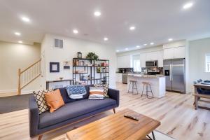 a living room with a couch and a table at Pet-Friendly Basye Vacation Rental with Fireplace! in Basye