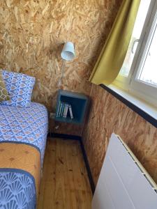 Una cama o camas en una habitación de Aster - Apt 2/4 personnes - Vue mer