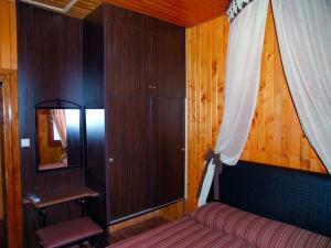 Postel nebo postele na pokoji v ubytování Wooden Nest