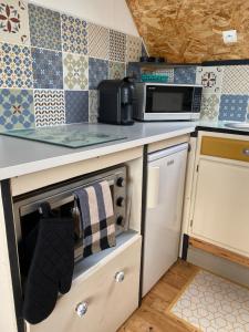 Una cocina o cocineta en Aster - Apt 2/4 personnes - Vue mer