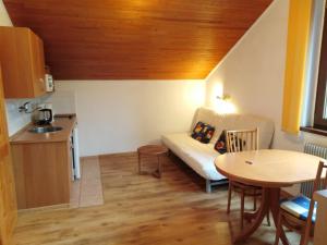 Kuchyňa alebo kuchynka v ubytovaní Apartmány Šmika