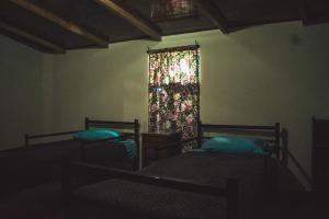 Cama ou camas em um quarto em Santa Pacha