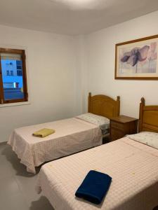 Ένα ή περισσότερα κρεβάτια σε δωμάτιο στο Triana 72