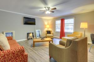 a living room with a couch and chairs at Cozy and Convenient Macon Home about 3 Mi to Town! in Macon