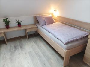 Postel nebo postele na pokoji v ubytování Apartmán UšeBu