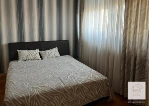 Postel nebo postele na pokoji v ubytování Diva