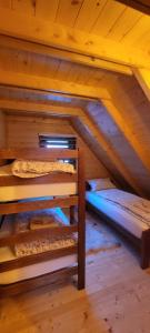 Postel nebo postele na pokoji v ubytování Apartmani Prica