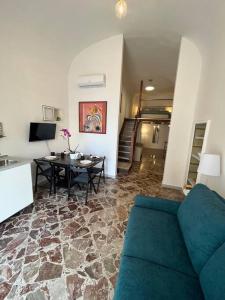 Μια τηλεόραση ή/και κέντρο ψυχαγωγίας στο Casa vacanze Piazza San Pietro +9 φωτογραφίες