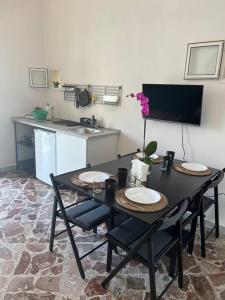 Η κουζίνα ή μικρή κουζίνα στο Casa vacanze Piazza San Pietro