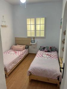 Posteľ alebo postele v izbe v ubytovaní Apartamento Veracruz