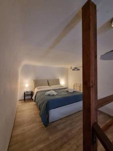 Ένα ή περισσότερα κρεβάτια σε δωμάτιο στο Casa vacanze Piazza San Pietro