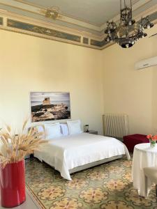 Postel nebo postele na pokoji v ubytování Armonia B&B