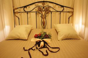 Postel nebo postele na pokoji v ubytování Hotel Dryalos