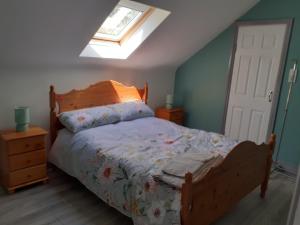 Postel nebo postele na pokoji v ubytování Foreen Lodge, Achill Island