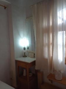 Postel nebo postele na pokoji v ubytování Harmonic Place Loutraki