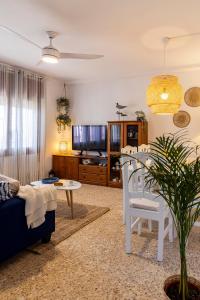 a living room with a couch and a table at Apartamentos Maruja Roig 1 Playa Sur in Peniscola