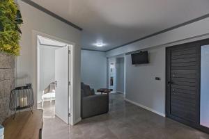 TV a/nebo společenská místnost v ubytování Os Ninhos dos Avôs