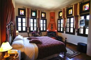 Postel nebo postele na pokoji v ubytování Hotel Dryalos
