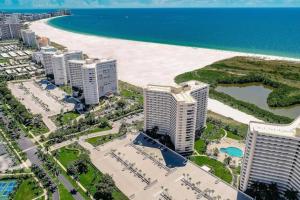 an aerial view of a beach and buildings at Beachfront I Full Coastal Contemporary Renovation in Marco Island