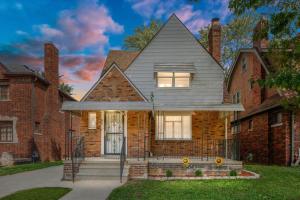a brick house with a gray roof at Stylish, Tranquil & Comfy ~ Queen Beds ~ Pkg in Detroit