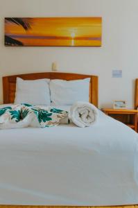 Postel nebo postele na pokoji v ubytování Casa Chetumal Hotel + 37 fotografií
