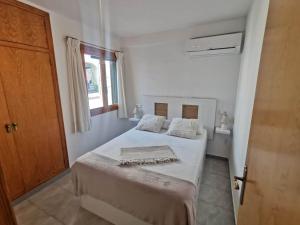 Posteľ alebo postele v izbe v ubytovaní Oleza Garden Village , Apartment Ines