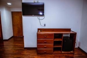 TV a/nebo společenská místnost v ubytování Tajy Iguazu Hotel