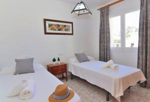 Postel nebo postele na pokoji v ubytování 110 Villa Balandre ETV4718 by Mallorca Charme