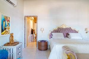 Postel nebo postele na pokoji v ubytování Hotel Pousada Boutique Coco Bambu Morere