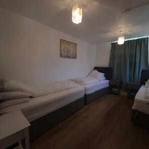 A bed or beds in a room at Lovely 1 bedroom apartment