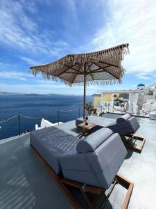 Fotografie z fotogalerie ubytování Oinos Luxury Suites Caldera v destinaci Oia