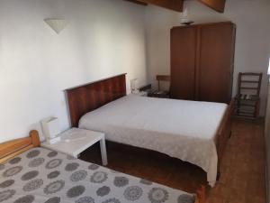 Posteľ alebo postele v izbe v ubytovaní Maison de vacances à 200m de la plage avec jardin, pour 5 pers. à Notre-Dame-de-Monts - FR-1-540-181