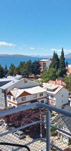 a view from the balcony of a building at Reina Mora Apart Bariloche in San Carlos de Bariloche