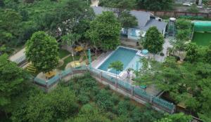 an aerial view of a swimming pool in a yard at Estrella Ba Vì Villas - Venuestay in Ba Vì