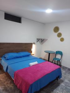 Postel nebo postele na pokoji v ubytování HOTEL DEPARTAMENTAL