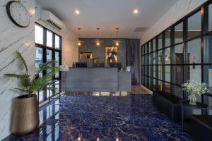 Vstupní hala nebo recepce v ubytování Cozy Blu Suvarnabhumi + 37 fotografií