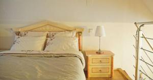 Кровать или кровати в номере Appartements Victor et Hugo
