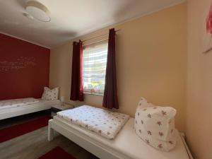 Postel nebo postele na pokoji v ubytování Holiday home in Walkenried with sauna